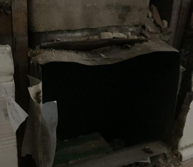 asbestos covered air duct in home